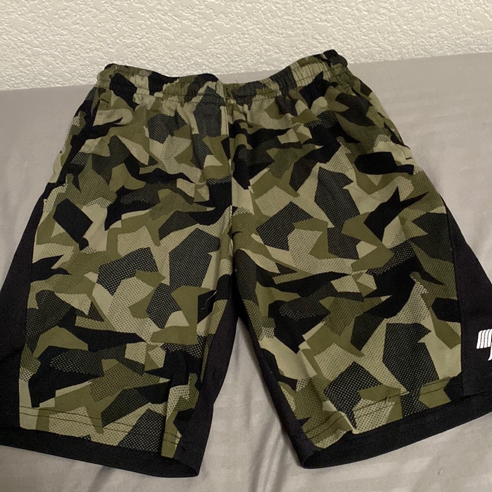 Two basketball shorts for boys